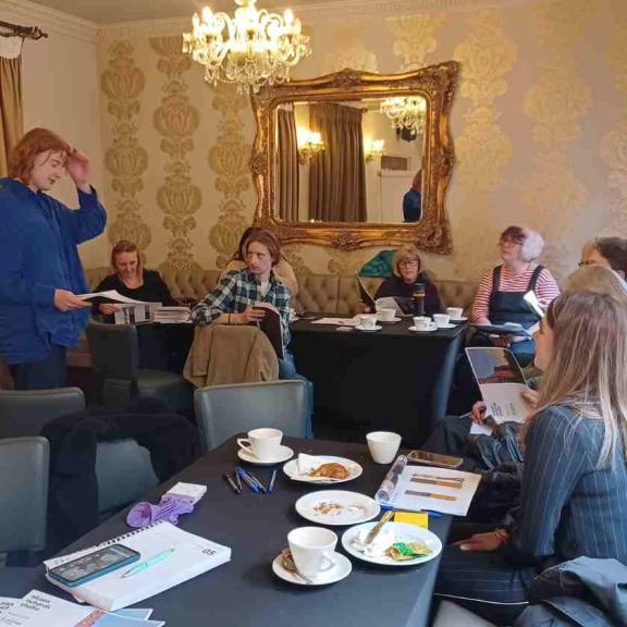 Meeting between 7 people in the Newark Castle for all group discussing ideas over coffee and pastries