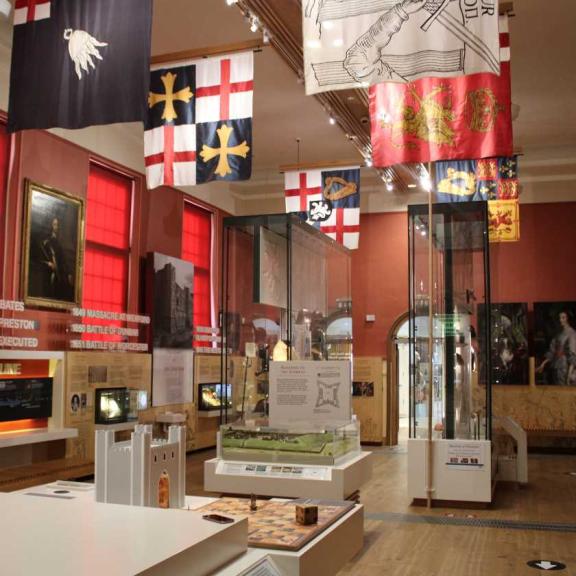 Gallery space at the National Civil War Centre with flags and display cases