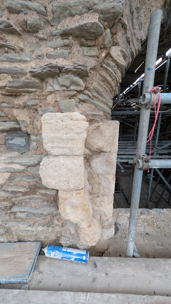 The left side of the round window showing the clear arc