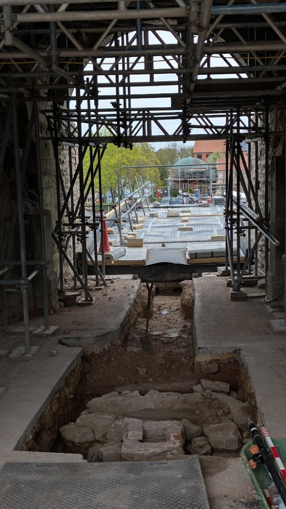 view looking out of the Gatehouse to the new stairs, showing the mortar cap over the well found inside the Newark Castle Gatehouse