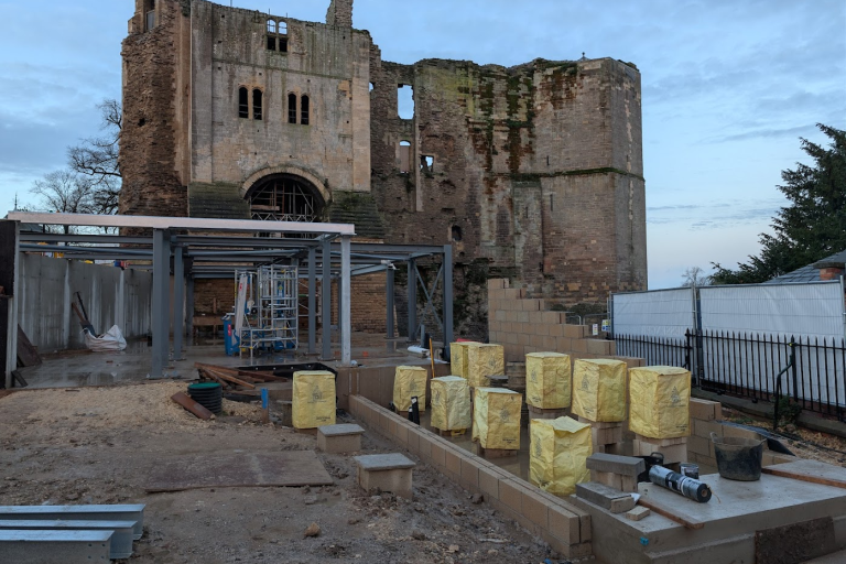 Newark Castle under construction with metal shell of new garden room