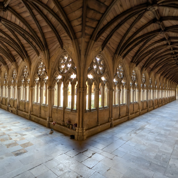 Old cathedral corridors leading away from each other symetrically