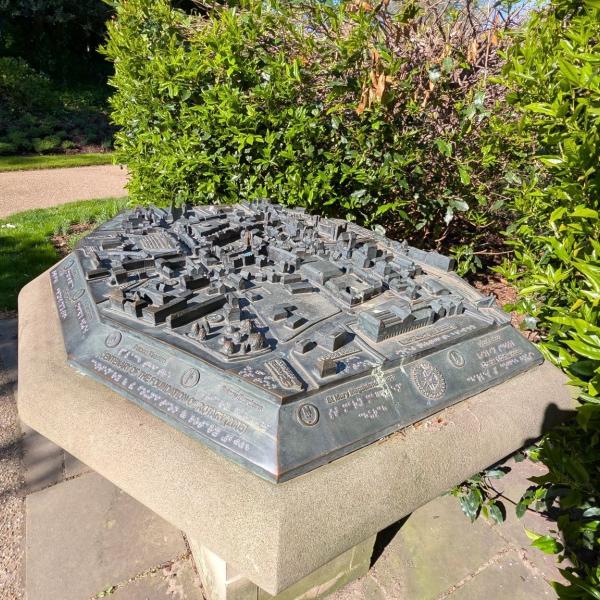Bronze tactile map with raised features, braille and engraved text.